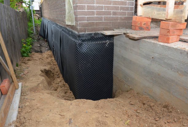 SJ Waterproofing Pros technician performing targeted Sump Pump Installation assessment in Gibbstown, NJ